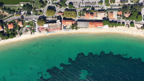 Seaside-resort-paradise-sandy-beach-Cavaliere-city-aerial-top-shot-sunny-day